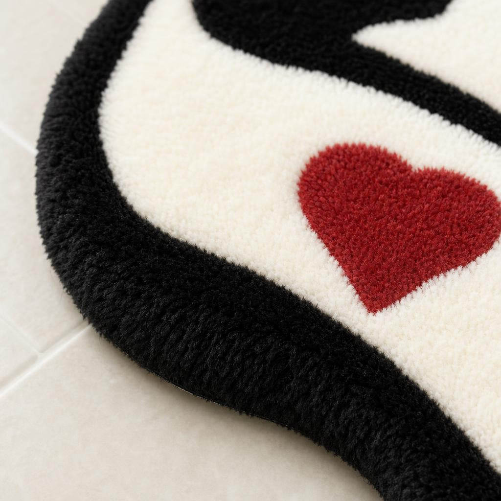 Gothic heart ghost bath mat - close-up texture detail