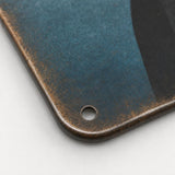 Ghost toilet paper metal sign - close-up texture detail